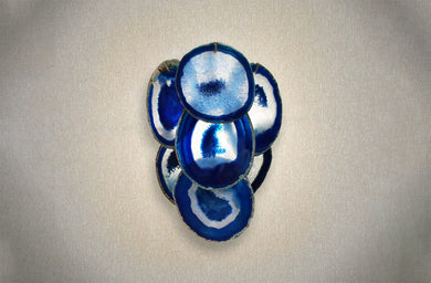 Camille modern luxury wall sconce with indigo color petals made of brazilian agate cast